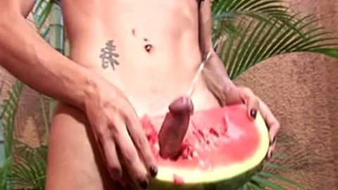 shemale Strokes And pokes Her large Shecock In A Watermelon