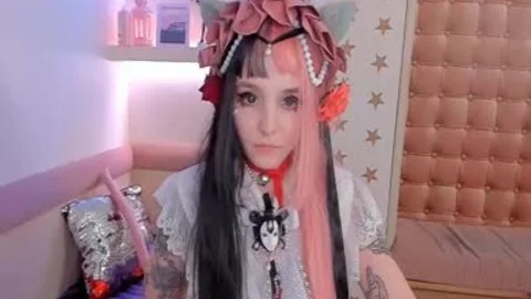 tgirl Cosplayer Puts Rubber shlong Up To The face hole
