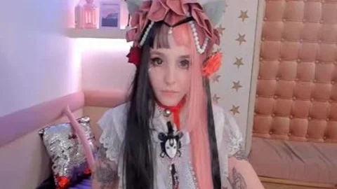 tgirl Cosplayer Puts Rubber shlong Up To The face hole