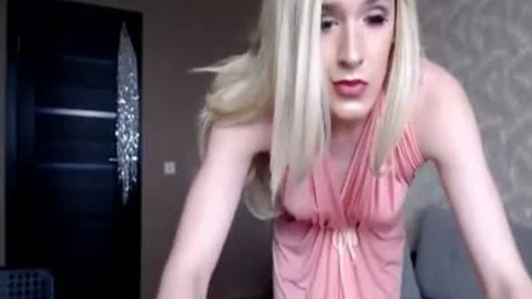 blond Trans playgirl In Pink dress Shows Off Her Body On web camera
