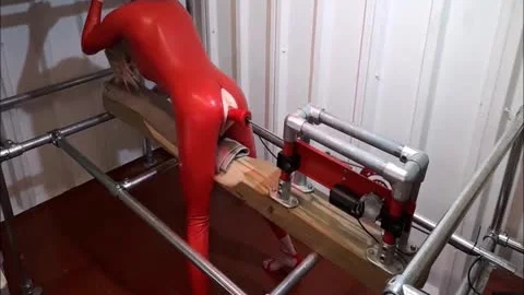 RachelSexyMaid 34 Dungeon Fuckmachine In Red Latex Catsuit
