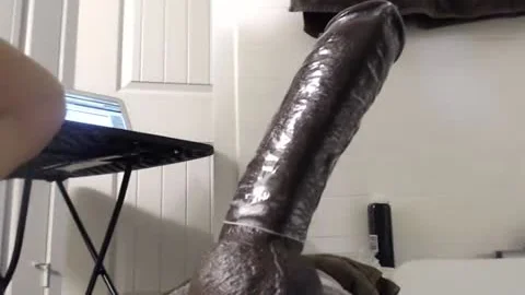 Riding biggest fake penis