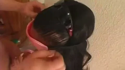 handcuffed asian cutie sucks A Prick