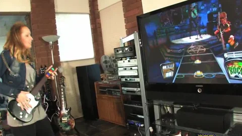 Khloe Hart Playing Guitar Hero