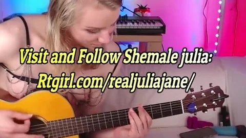 blond Trans sweetie Plays The Guitar On web camera